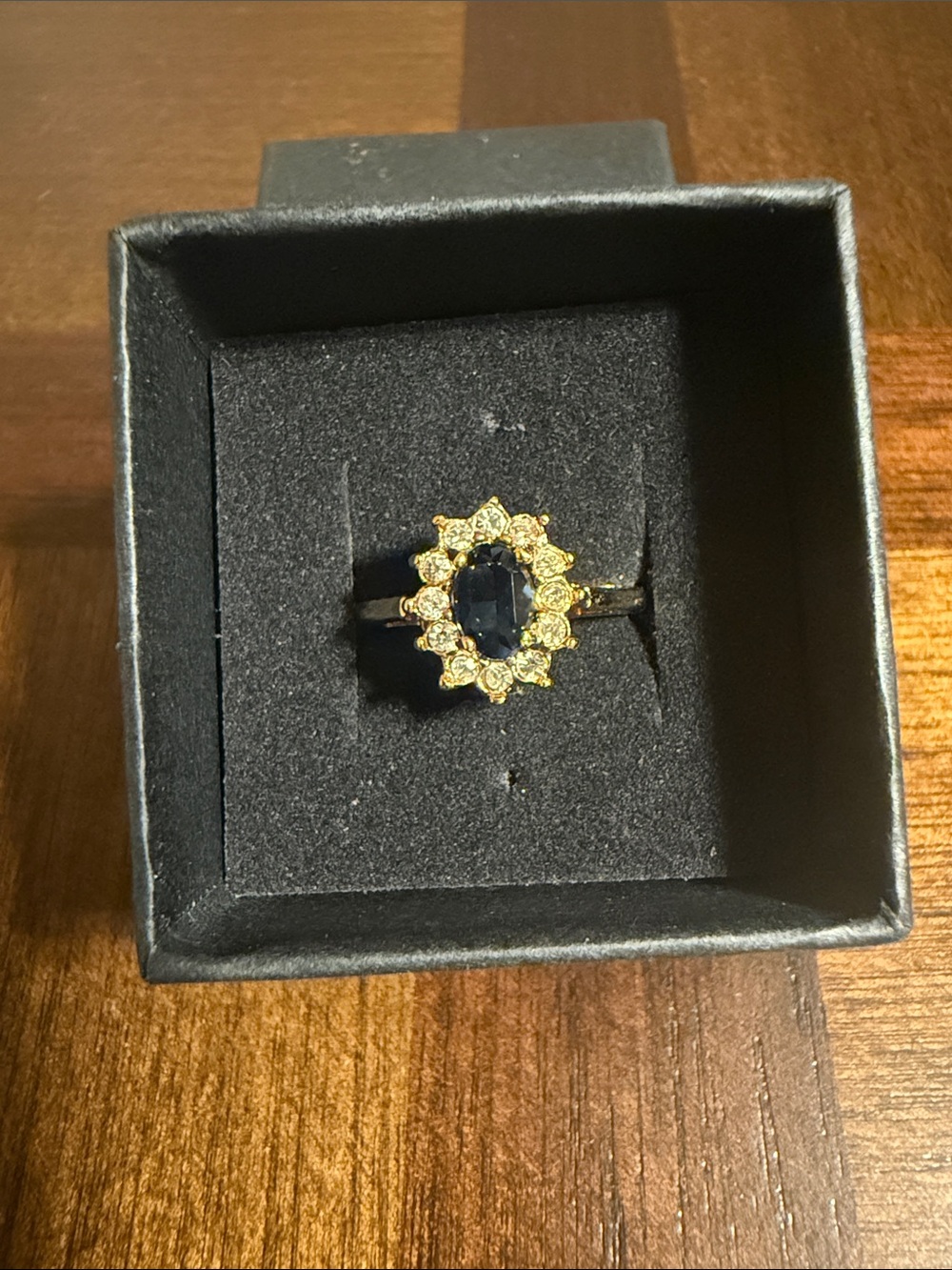 Vintage Gold Halo Ring with Deep Blue Center Stone